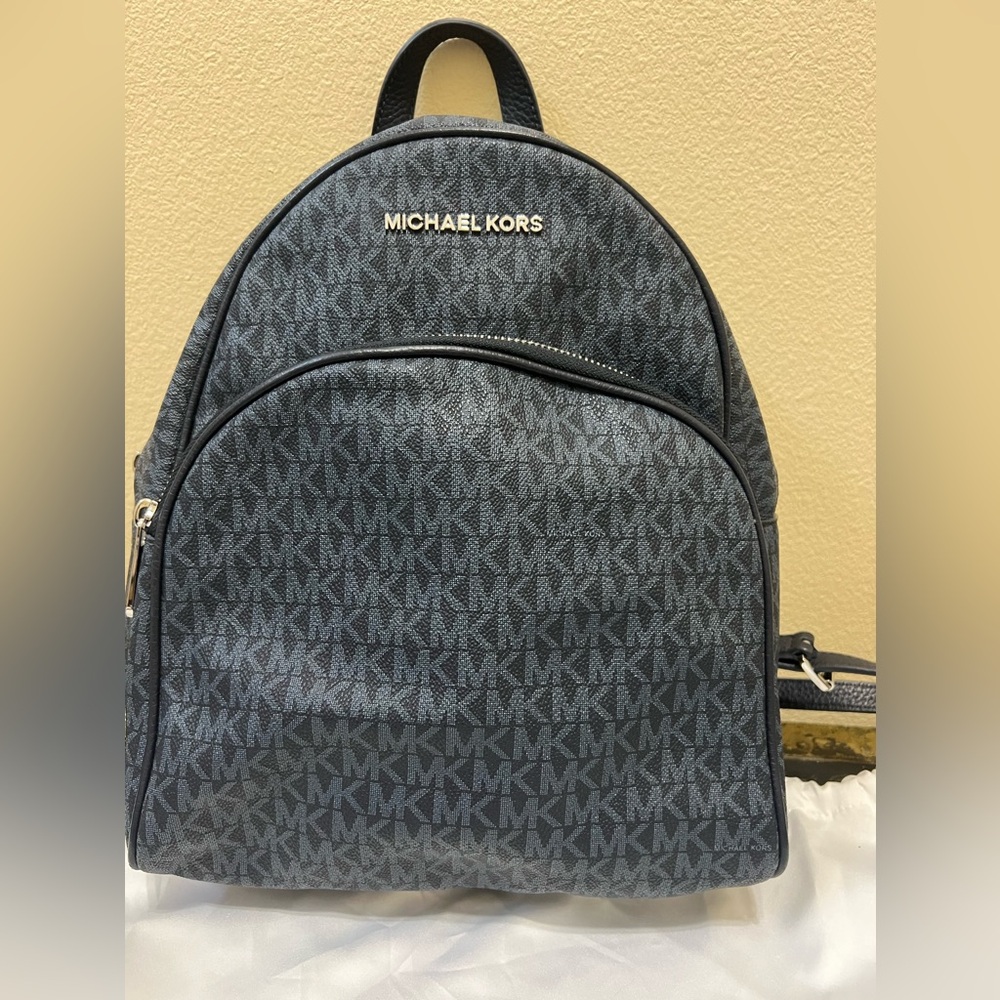 Michael Kors ladies navy blue back pack.